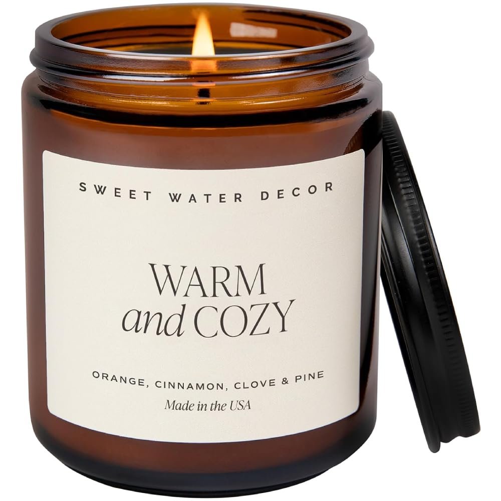 Sweet Water Decor Warm and Cozy Soy Candle - Orange Peel, Cinnamon, Ginger and Clove Scented Candles for Home - 9oz Amber Jar + Black Lid, 40+ Hour Burn Time, Made in the USA 1 sweetwaterdecorwarmandcozysoycandle orangepeelcinnamonginger